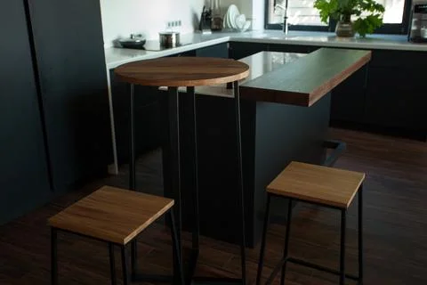 Empty coffee table over defocused coffee shop background with copy space Stock Photos