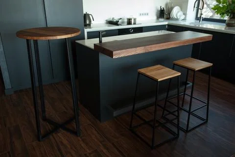 Empty coffee table over defocused coffee shop background with copy space Stock Photos
