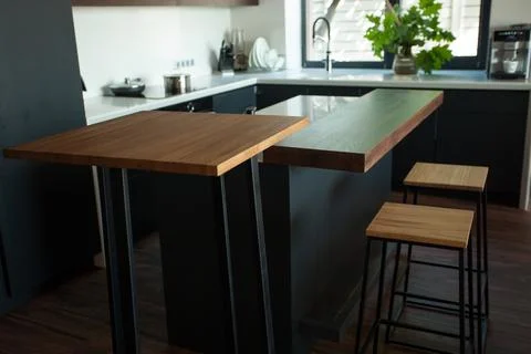 Empty coffee table over defocused coffee shop background with copy space Stock Photos