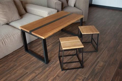 Empty coffee table over defocused coffee shop background with copy space Stock Photos