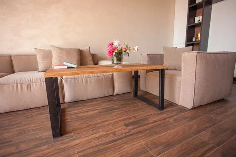 Empty coffee table over defocused coffee shop background with copy space Stock Photos