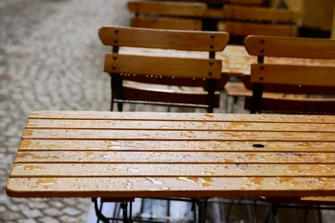 Empty coffee tables in the rain Stock Photos