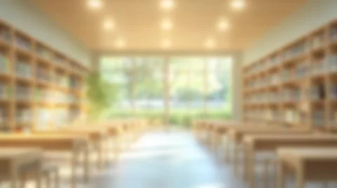 Empty college library space, academic atmosphere with books and desks Stock Photos