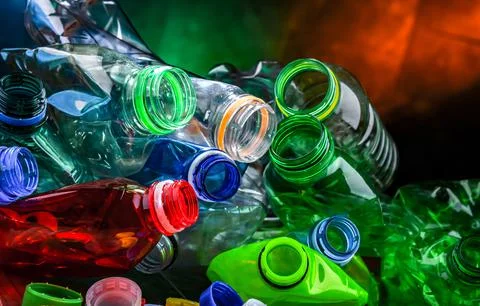 Empty colored drink bottles. Recyclable plastic waste. Stock Photos