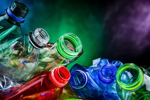 Empty colored drink bottles. Recyclable plastic waste. Stock Photos