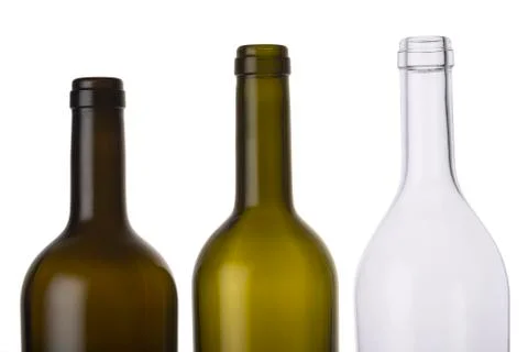 Empty colored wine bottles isolated on white background 스톡 사진