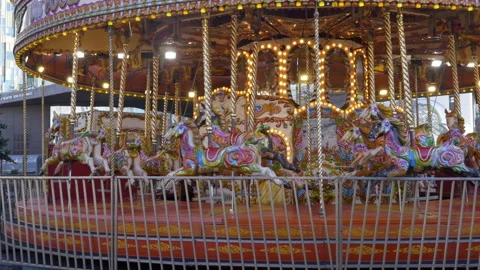 Empty Colorful Carousel Spinning In Fairground, London Stock Footage 326357077