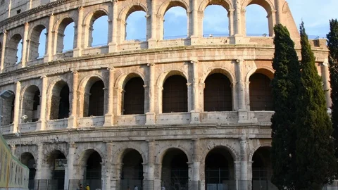 Empty Colosseum illuminated at sunset Stock Footage 128179195