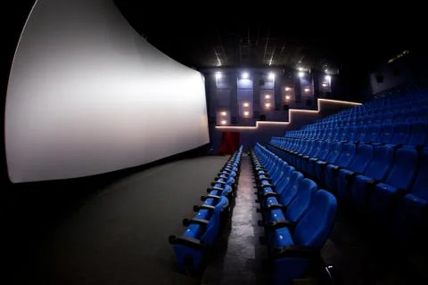 Empty comfortable red seats with numbers in cinema	 Stock Photos