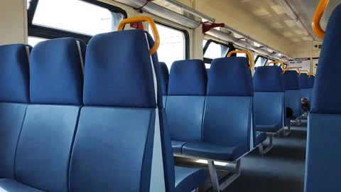 Empty commuter train car inside. Blue seats. Country trip. Economy class. Stock Footage 247137324