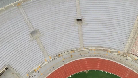 Empty concrete bleachers and running track at Pacaembu Municipal stadium in São Vidéo 335427126