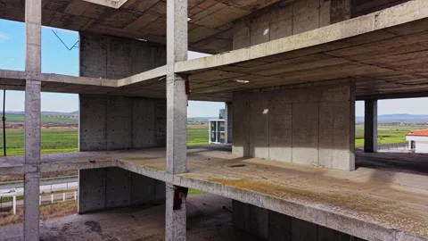 Empty concrete structure with rural landscape in the background Stock Footage 325085960