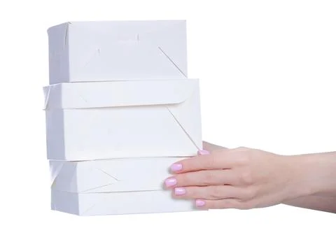 Empty confectionery boxes for cupcake cakes in hand Stock Photos