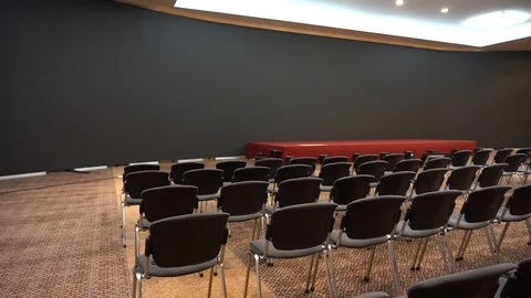 Empty conference hall with large number of seats slider shoot. Conference room Stock Footage 103701872