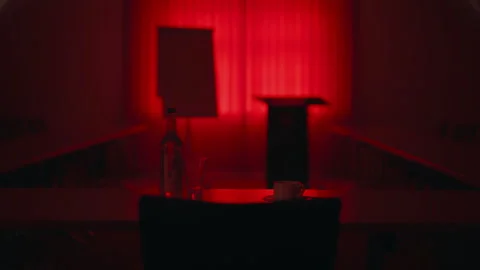 Empty conference room illuminated by red light 스톡 동영상 335493540