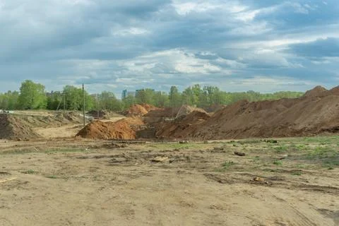 Empty construction site with piles of sand. Great background for real estat.. 스톡 사진