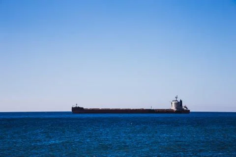 Empty container cargo ship in ocean Stock Photos