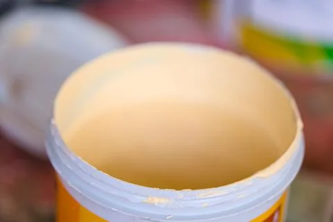 Empty container of paint ready for disposal and recycling Stock Photos