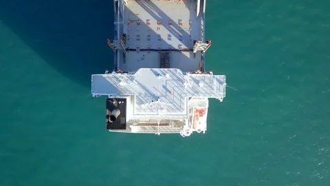 Empty container ship at sea - Top down aerial footage. Stock Footage 100050375