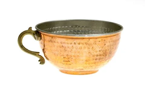 Empty copper cup isolated on white background. Stock Photos