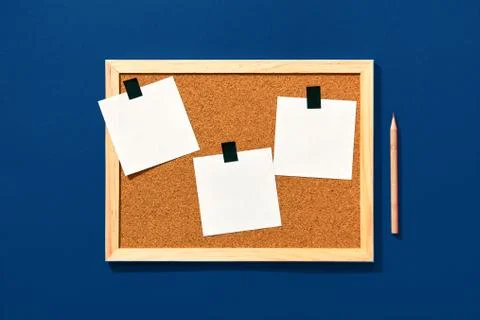 Empty cork board with blank notes and pencil Stock Photos