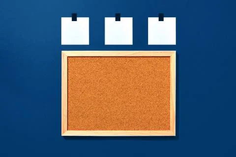 Empty cork board with blank notes on red background Stock Photos