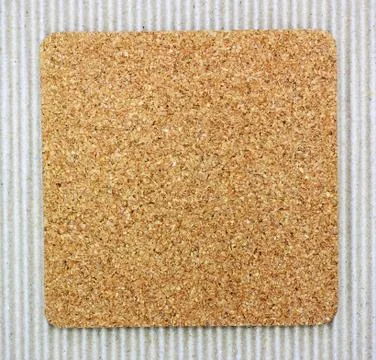 Empty corkboard on corrugated paper Stock Photos