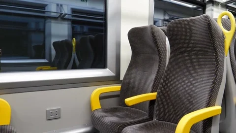 Empty corridor and seats in modern train Stock Footage 83628360