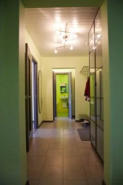 Empty corridor in the apartment. open bathroom door Stock Photos