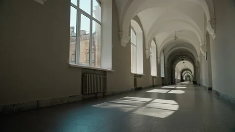Empty corridor in university hall long college hallway academy high school Video stock 293346589