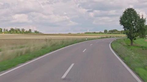 Empty Country Road Driving POV Shot with Clear Horizon Stock Footage 322014841