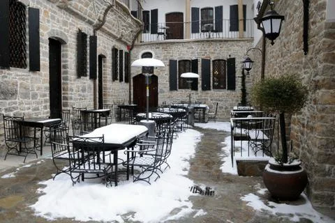 Empty courtyard restaurant in the winter Stock Photos