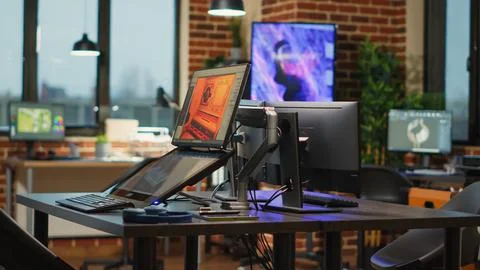 Empty creative agency studio filled with workstations to create content Stockfoto's