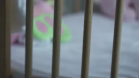 Empty crib with pink toys 動画素材 61197068
