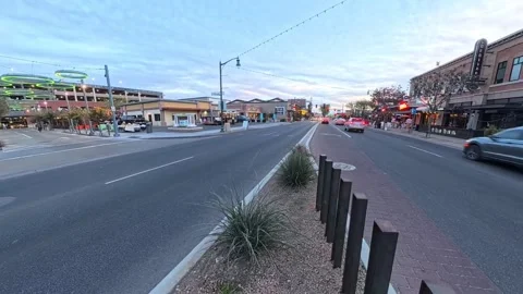 Empty crosswalk and moving traffic in Heritage District at dusk Stock Footage 303618349