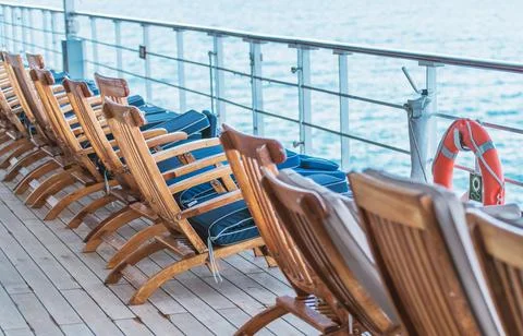 Empty Cruise Ship Main Deck with Deckchairs Stock Photos