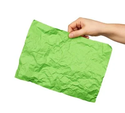 Empty crumpled green rectangular sheet of paper a4 female hand hold empty ... Stock Photos