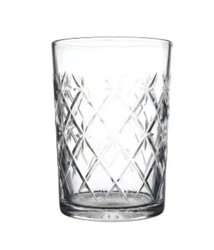 Empty crystal glass with patterns isolated on white background. Stock Photos