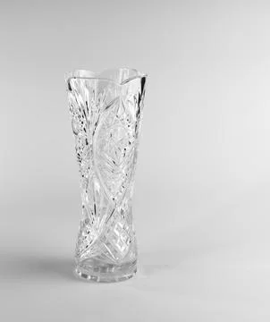 Empty crystal vase on white background. The vase was made in the mid-20th c.. Stock Photos
