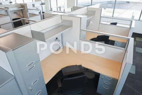 Empty cubicles in office Stock Photos