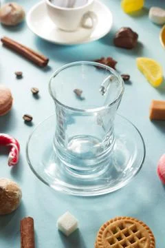 Empty cup at blue background Stock Photos