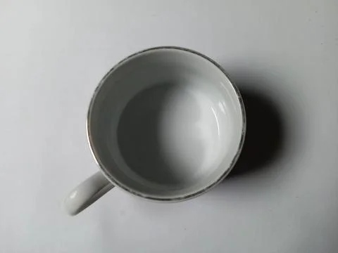 Empty cup closeup on white background. Foto stock