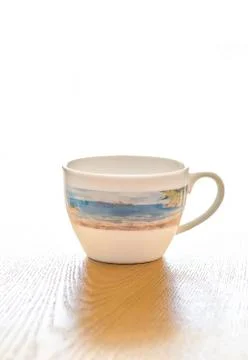 Empty cup of coffee or tea on table.Vertical image and white background Stock Photos