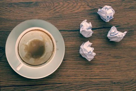 Empty cup of coffee with wrinkle Stock Photos
