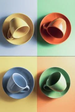 Empty cup at colorful background Stock Photos