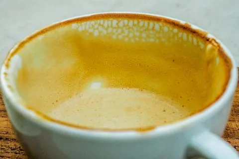 Empty cup of hot coffee with coffee mark in the white coffee cup Stock Photos