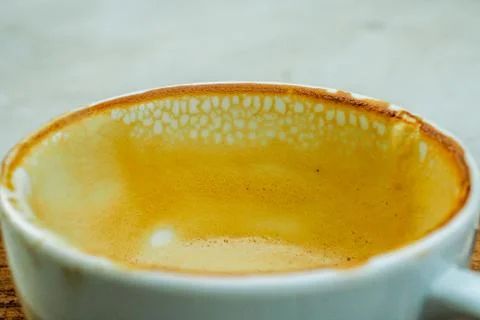 Empty cup of hot coffee with coffee mark in the white coffee cup Stock Photos