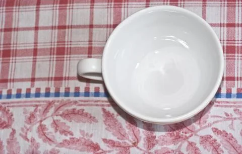 Empty cup of milk on the table Stock Photos