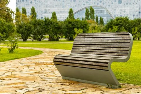 Empty curved park bench, close-up Stock Photos
