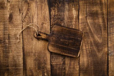 Empty cutting board Cutting Board on a old rustik table Stock Photos